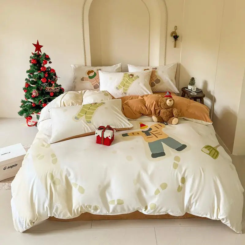 Bed with cartoon-themed bedding and a Christmas tree in the corner.