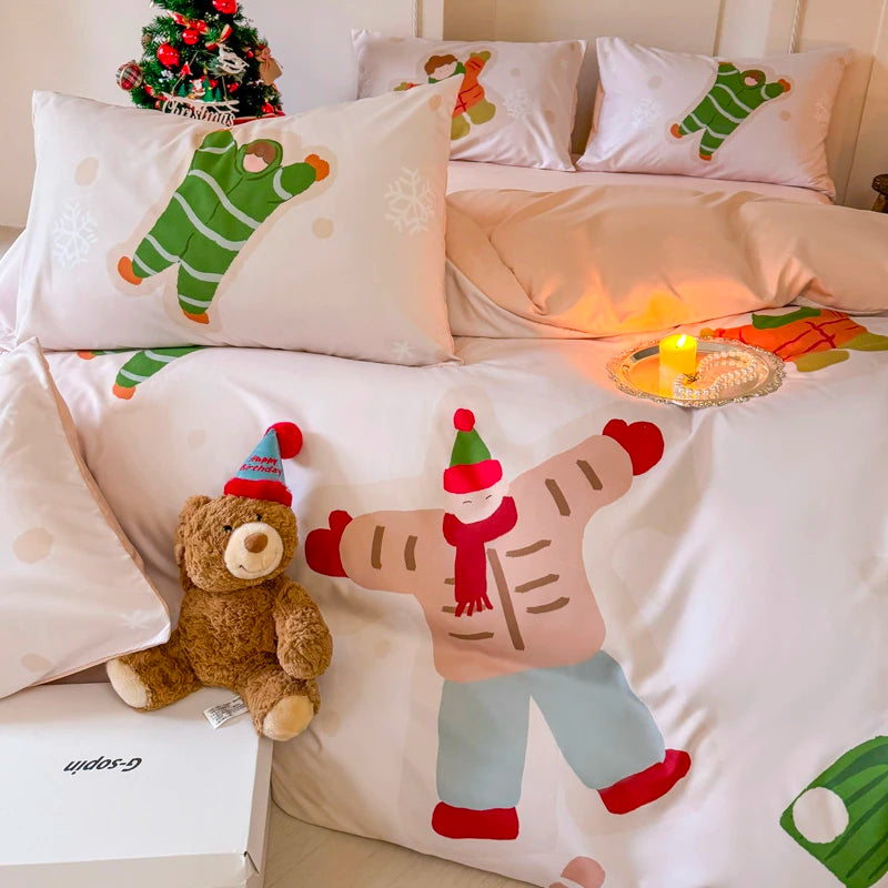 Bed with cartoon and bear-themed pillows and a teddy bear on a bed with a Christmas tree in the background.