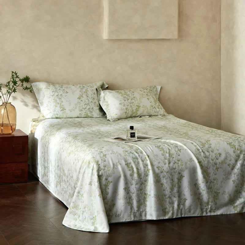 Bed with floral bedding in a bedroom setting