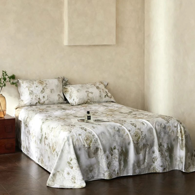 Bed with floral brown bedding in a bedroom setting