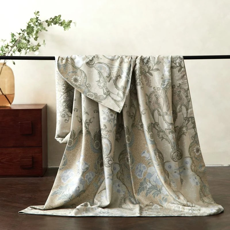 Bedsheet draped over a pipe with neutral background 
