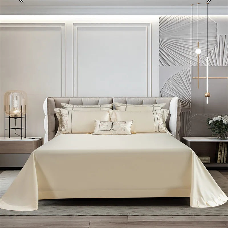 Beige bedding in a modern bedroom setting.
