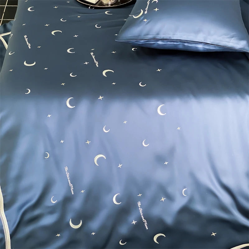 Blue bedding set with moon and star patterns