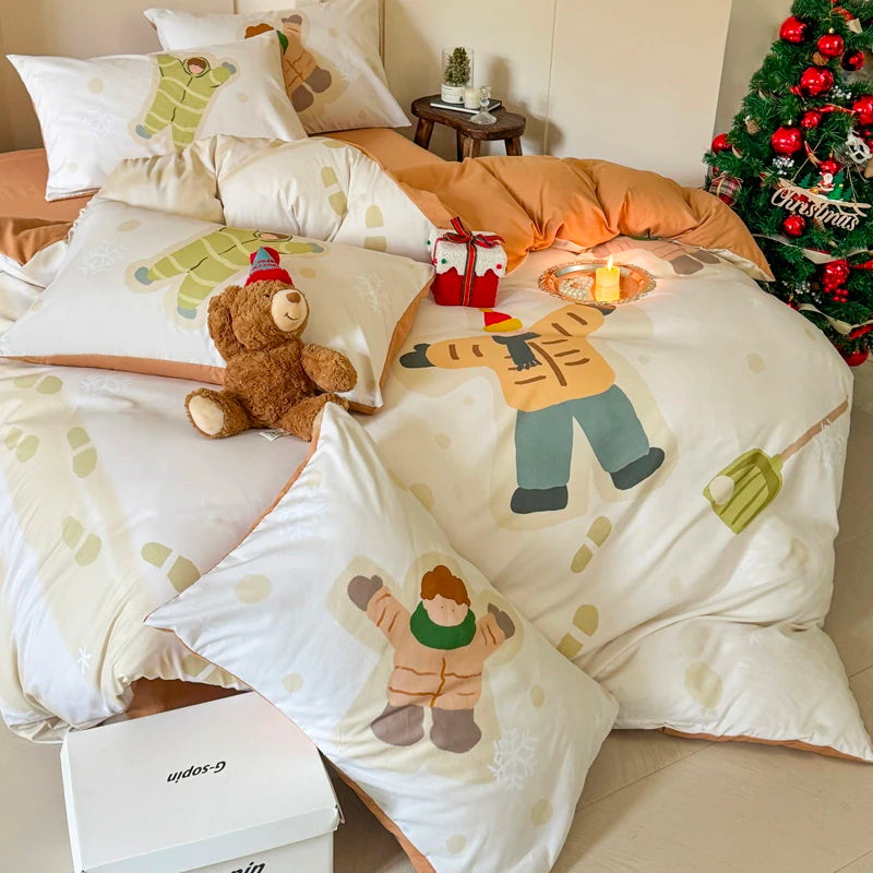 Children's bed with cartoon-themed bedding, teddy bear, and Christmas tree in the background.