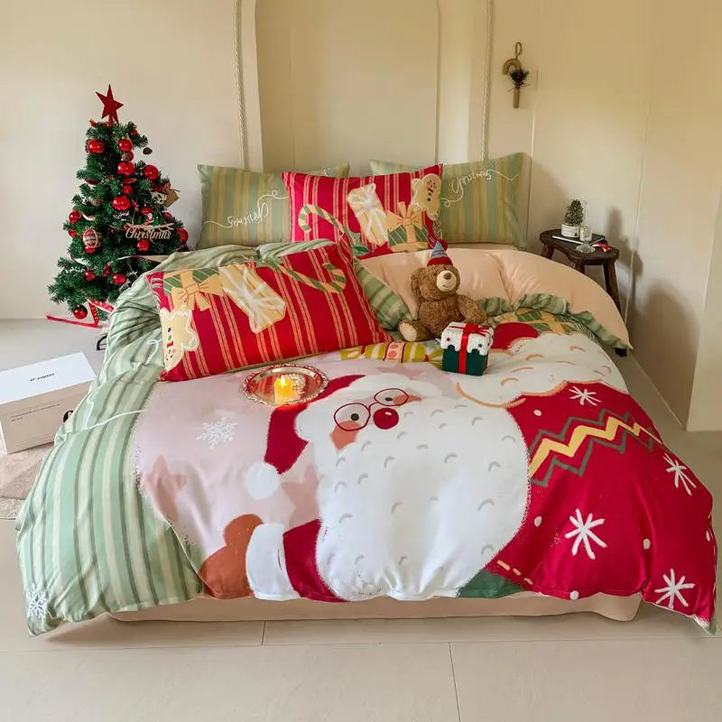 Christmas-themed bedding set with Santa Claus design on a bed, decorated room with a small tree.