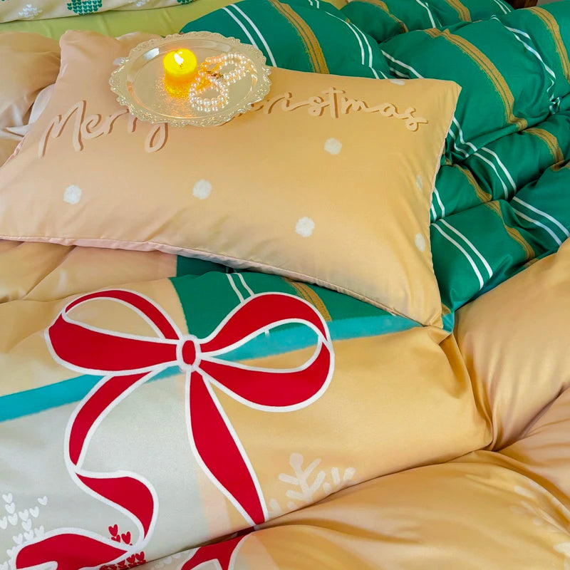 Christmas-themed bedding set with a pillow and duvet cover featuring festive designs.