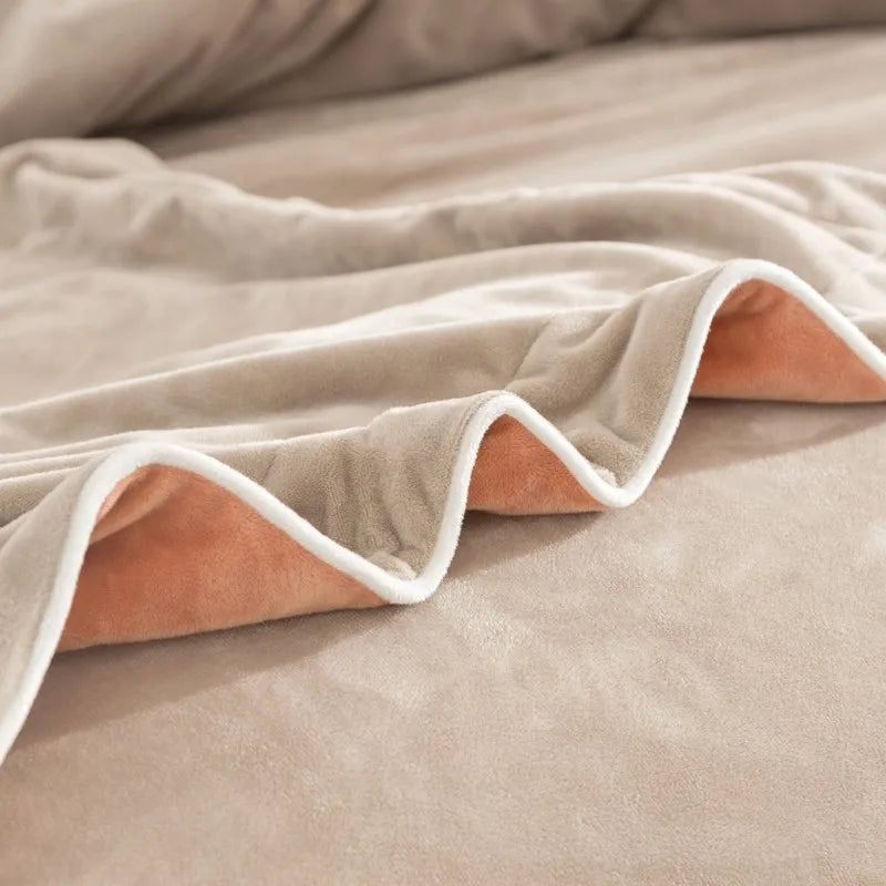 Close-up of a beige duvet with white trim on a bed 500TC Reversible Fluffy Microfiber bedding set