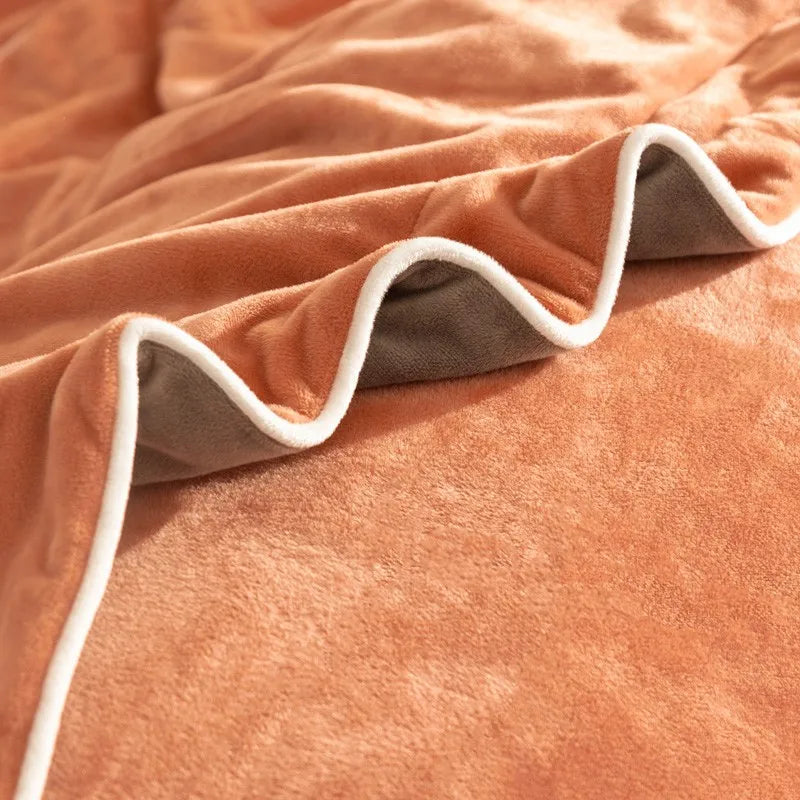 Close-up of a textured orange duvet cover with white trim