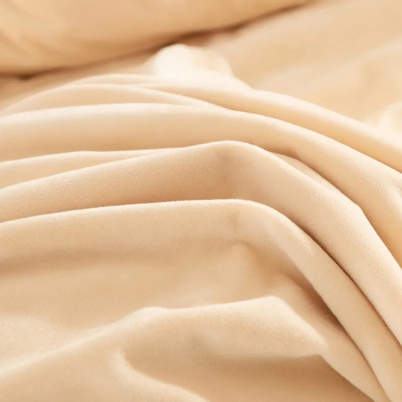 Close-up of beige duvet fabric with folds