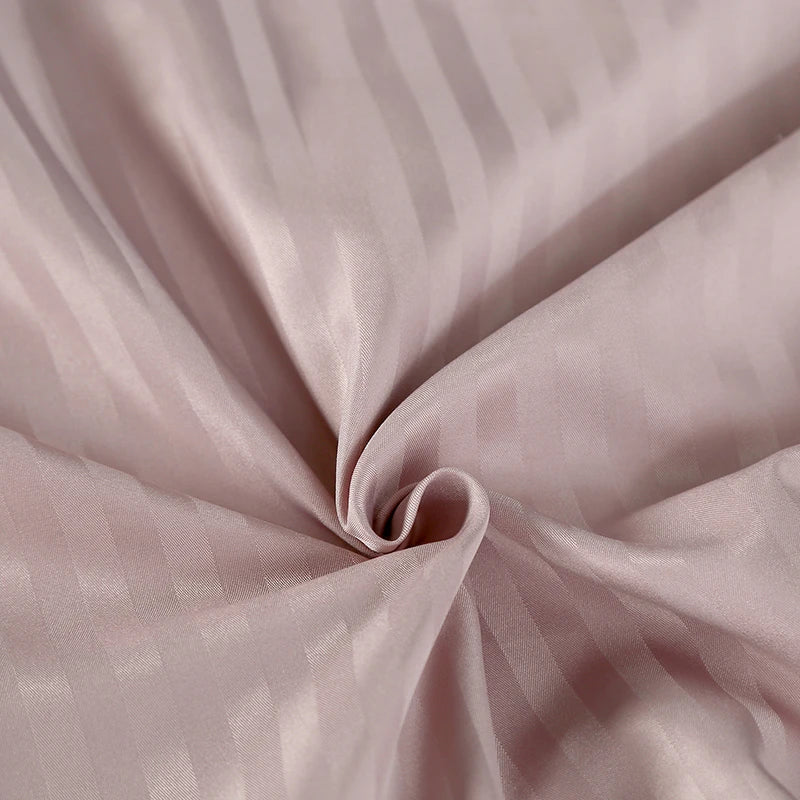 Close-up of pink fabric with a subtle pattern