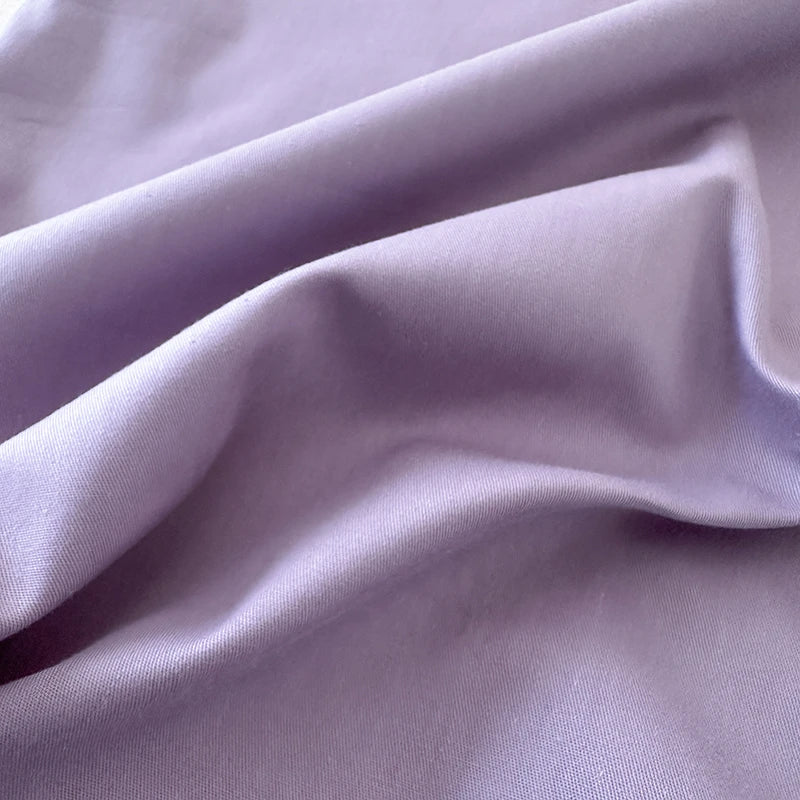 Close-up of purple fabric with folds