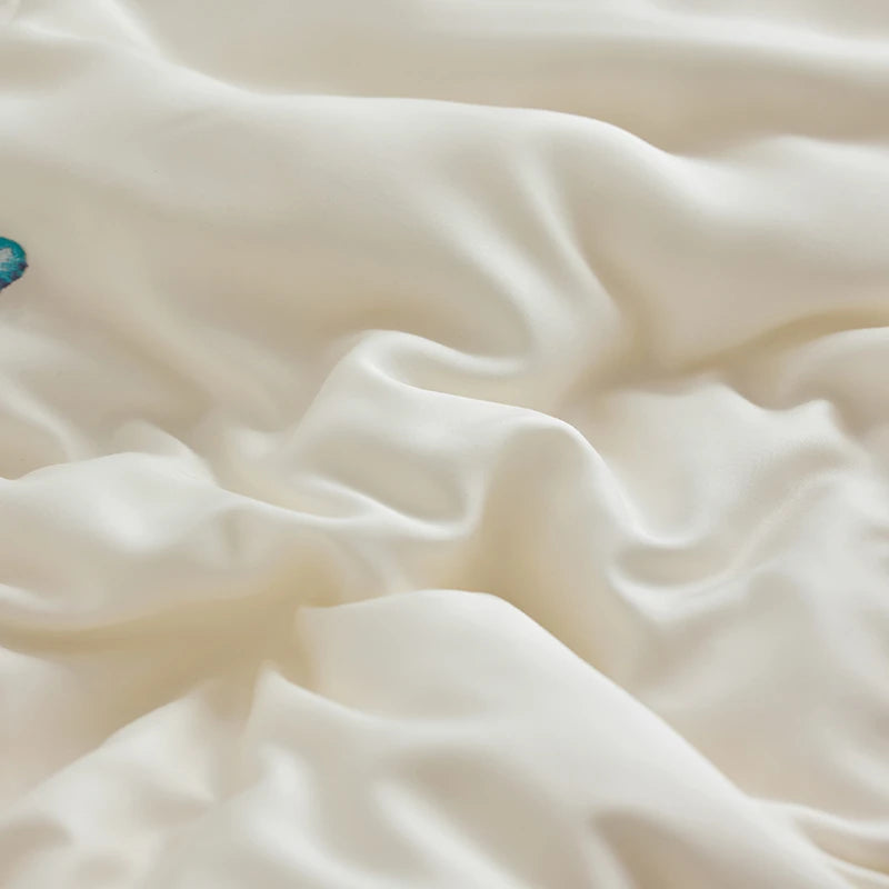 Close-up of soft, cream sheet with a slight texture