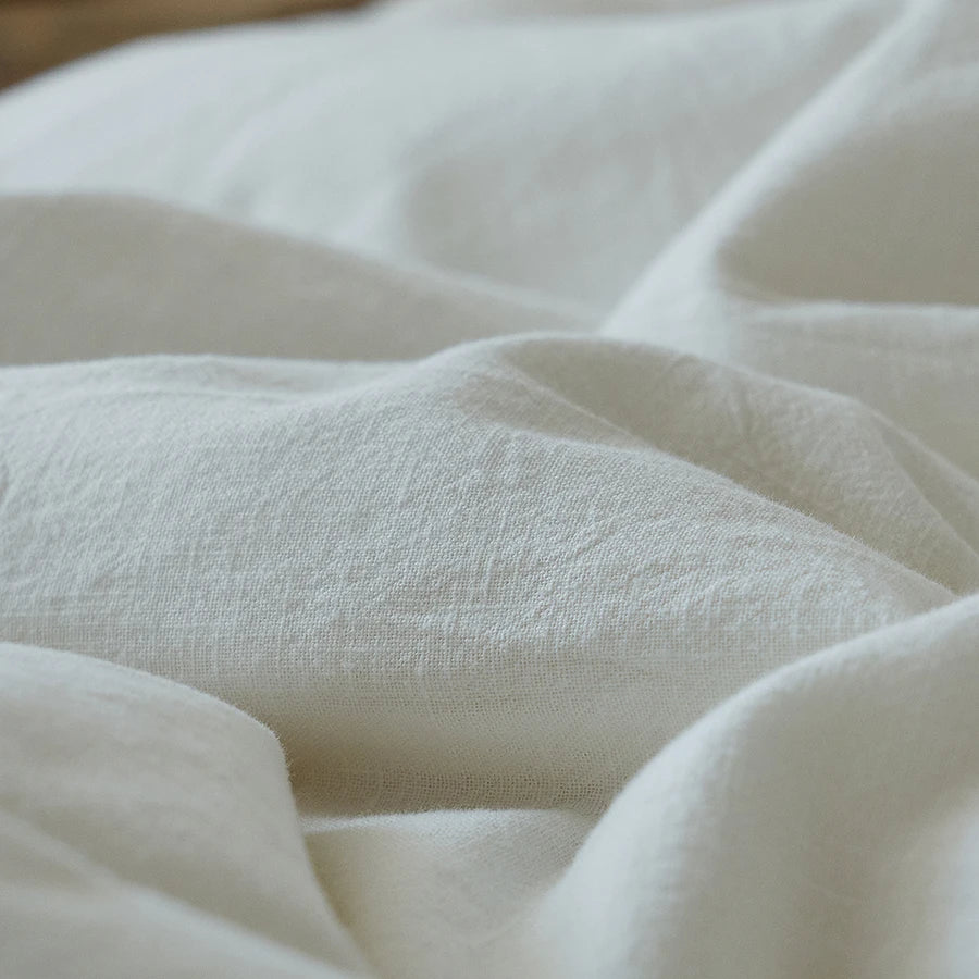 Close-up of white fabric with visible texture