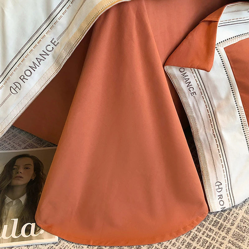 Close up of Rust and beige 1000TC Brushed Cotton Frame flat sheet