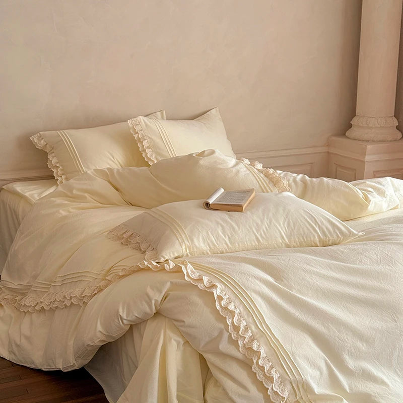 Cream-colored bedding set at The Happy Ladies