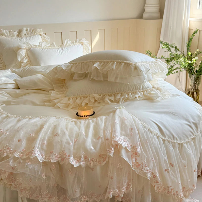 Delicate lace bedding set on a bed with a soft focus background