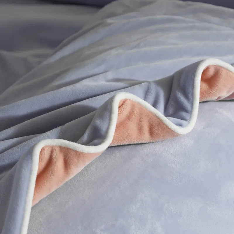 Purple duvet cover with peach and white trim