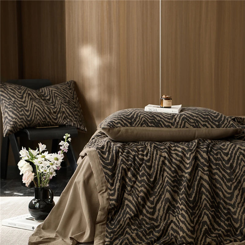 brown zig zag pattern cotton quilted blanket at the happy ladies