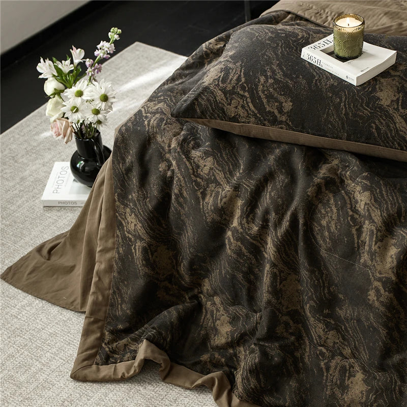 textured brown and black 100% cotton quilted blanket