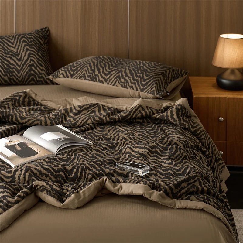 zig zag stripe brown quilted blanket at the happy ladies